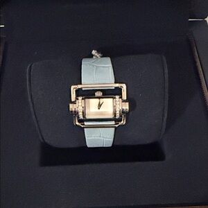 Chic Women's Watch with Blue Strap and Gold Accents